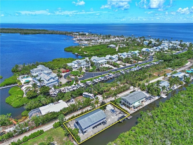 8161 Moyer Ln, Bokeelia, FL 33922 - aerial view of property and surrounding area featuring a large body of water and property boundaries highlighted