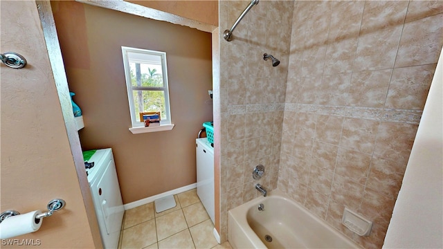 8161 Moyer Ln, Bokeelia, FL 33922 - full bath featuring washing machine and clothes dryer, tile patterned flooring, bathtub / shower combination, vanity, and baseboards