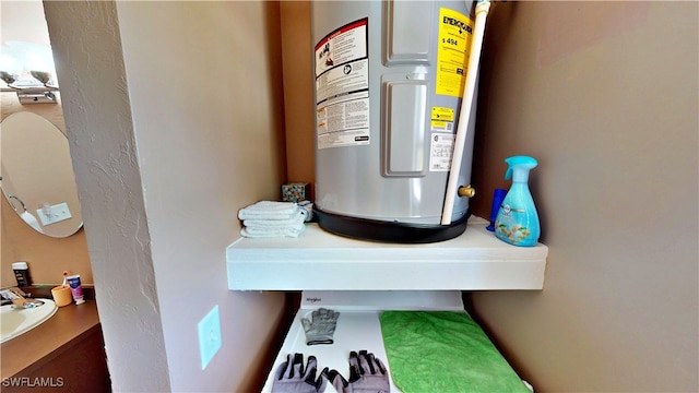 8161 Moyer Ln, Bokeelia, FL 33922 - detailed view of water heater and a sink