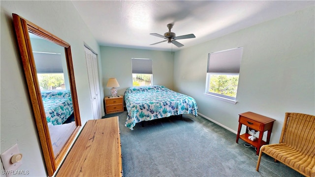 8161 Moyer Ln, Bokeelia, FL 33922 - carpeted bedroom with a closet, baseboards, and a ceiling fan