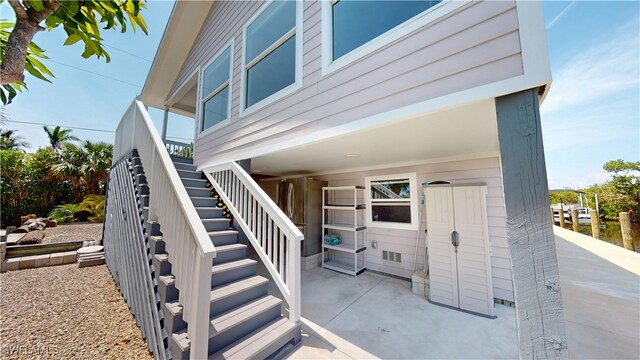 8161 Moyer Ln, Bokeelia, FL 33922 - entrance to property with a patio