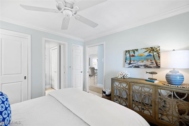 bedroom featuring ornamental molding, ceiling fan, and baseboards