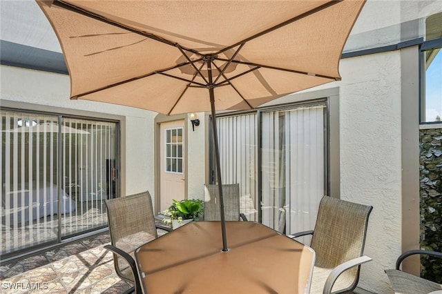 view of patio featuring outdoor dining space