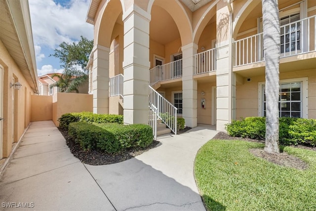26740 Rosewood Pointe Ln Unit 102, Bonita Springs, FL 34135 - entrance to property featuring stucco siding