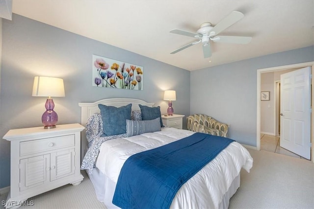 26740 Rosewood Pointe Ln Unit 102, Bonita Springs, FL 34135 - bedroom with light carpet, a ceiling fan, and baseboards