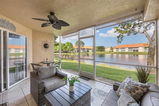 26740 Rosewood Pointe Ln Unit 102, Bonita Springs, FL 34135 - sunroom / solarium with a water view, ceiling fan, an outdoor hangout area, and a residential view