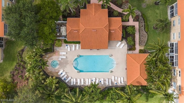 26740 Rosewood Pointe Ln Unit 102, Bonita Springs, FL 34135 - drone / aerial view of a pool