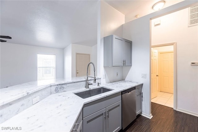 497 Bethany Village Cir, Lehigh Acres, FL 33936 - kitchen featuring dishwasher, gray cabinets, a sink, and dark wood finished floors