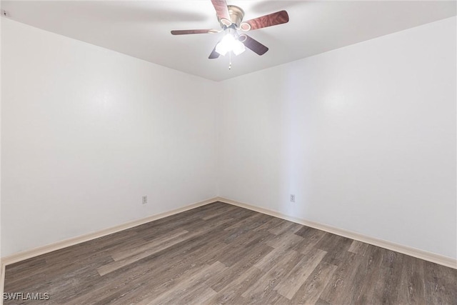 497 Bethany Village Cir, Lehigh Acres, FL 33936 - empty room featuring wood finished floors, ceiling fan, and baseboards