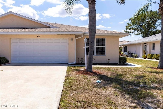 497 Bethany Village Cir, Lehigh Acres, FL 33936 - ranch-style home with stucco siding, concrete driveway, and a garage