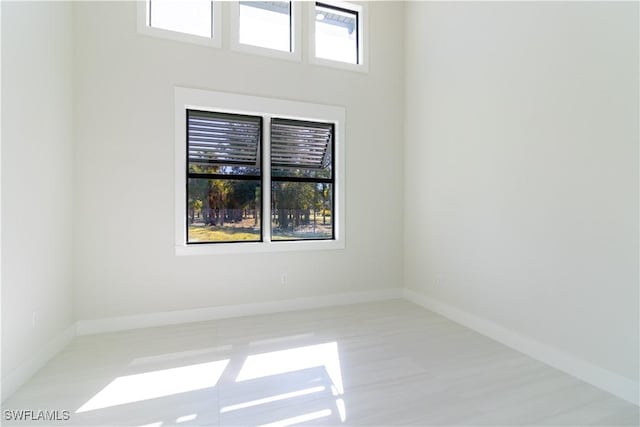2583 18th Ave SE, Naples, FL 34117 - spare room with baseboards