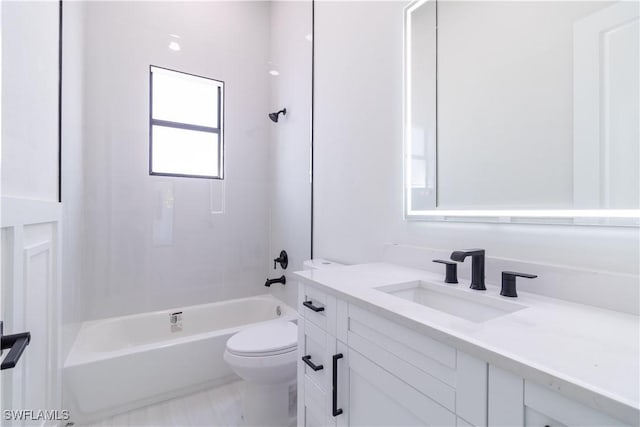 2583 18th Ave SE, Naples, FL 34117 - full bathroom featuring toilet, vanity, and tub / shower combination