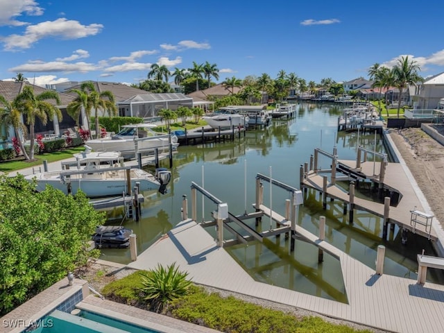 622 Bimini Ave, Marco Island, FL 34145 - dock featuring boat lift, a water view, and a residential view
