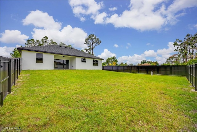 3300 18th St W, Lehigh Acres, FL 33971 - back of house with stucco siding