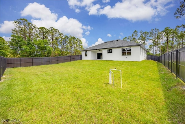 3300 18th St W, Lehigh Acres, FL 33971 - rear view of property with stucco siding