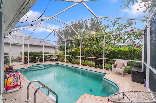 9750 Sassafras Ct, Estero, FL 33928 - outdoor pool with a patio area and a lanai