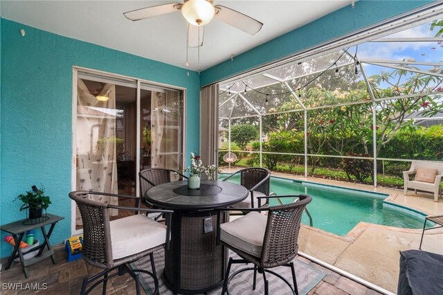 9750 Sassafras Ct, Estero, FL 33928 - outdoor pool featuring a patio, ceiling fan, and a lanai
