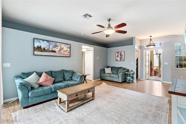 9750 Sassafras Ct, Estero, FL 33928 - living room with a ceiling fan, light wood-style flooring, and baseboards