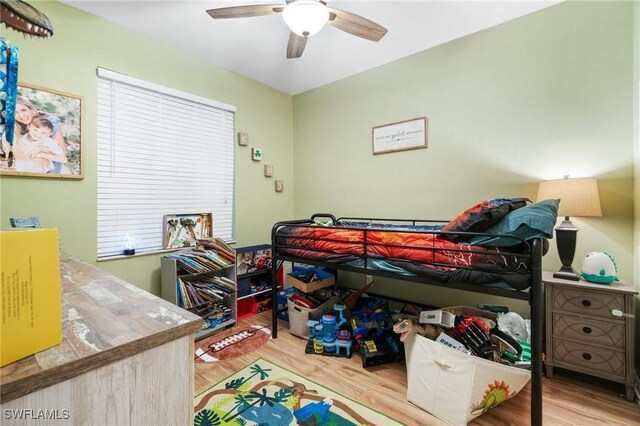 9750 Sassafras Ct, Estero, FL 33928 - bedroom featuring wood finished floors and ceiling fan