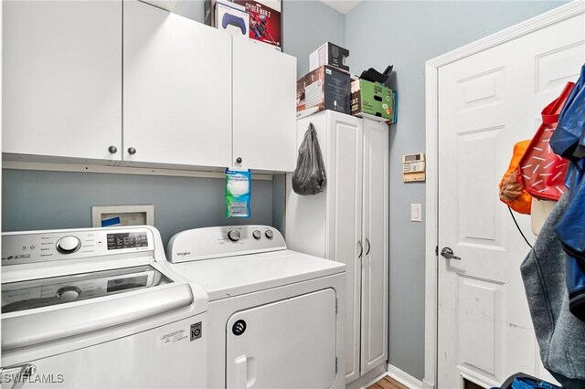 9750 Sassafras Ct, Estero, FL 33928 - washroom featuring washer and dryer and cabinet space