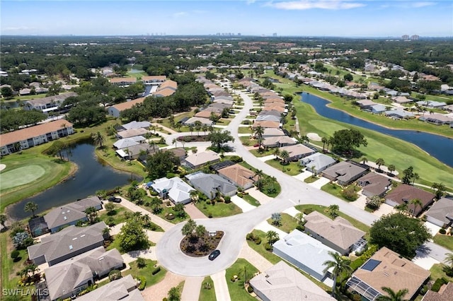 9750 Sassafras Ct, Estero, FL 33928 - aerial perspective of suburban area featuring a golf club and a large body of water