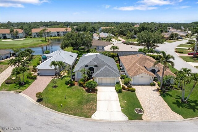 9750 Sassafras Ct, Estero, FL 33928 - aerial view of residential area featuring a large body of water