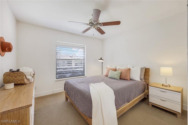 8336 Charter Club Cir Unit 10, Fort Myers, FL 33919 - bedroom with carpet, baseboards, and ceiling fan