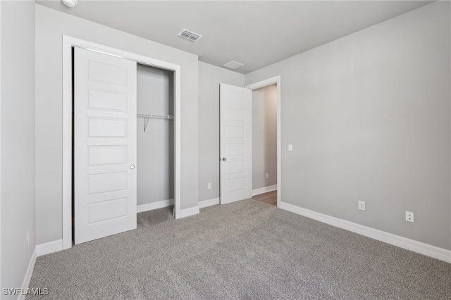 16678 Expedition Ct, Punta Gorda, FL 33982 - unfurnished bedroom featuring carpet, a closet, and baseboards