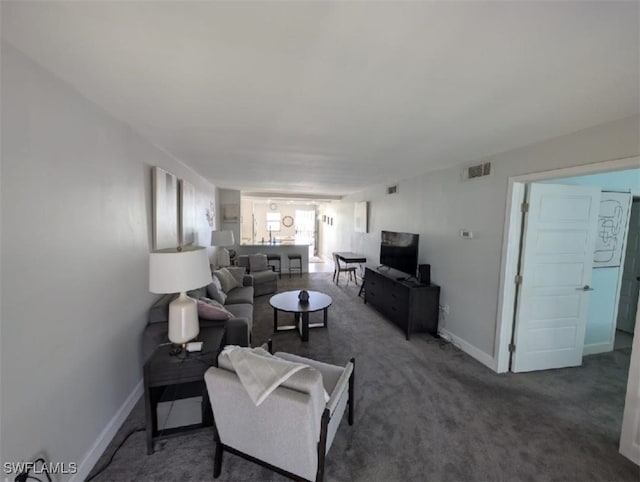 2111 Barkeley Ln Unit 13, Fort Myers, FL 33907 - living area featuring baseboards and carpet