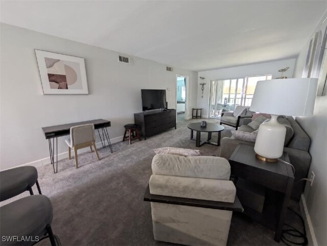 2111 Barkeley Ln Unit 13, Fort Myers, FL 33907 - living area featuring carpet floors and baseboards