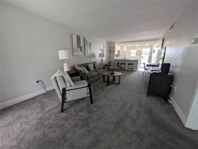 2111 Barkeley Ln Unit 13, Fort Myers, FL 33907 - carpeted living room with baseboards