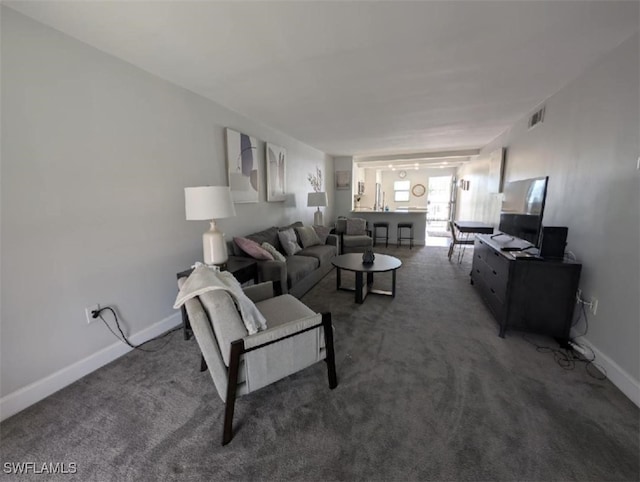 2111 Barkeley Ln Unit 13, Fort Myers, FL 33907 - carpeted living area featuring baseboards