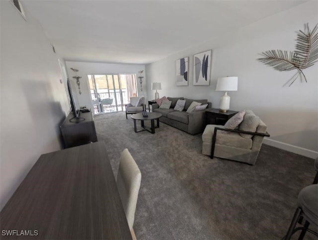 2111 Barkeley Ln Unit 13, Fort Myers, FL 33907 - living room with carpet floors and baseboards