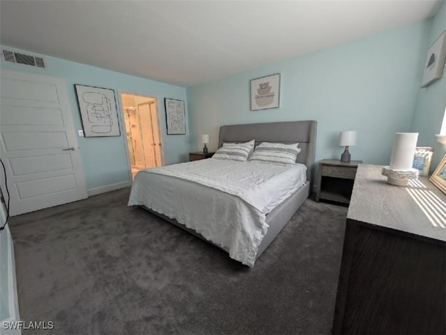 2111 Barkeley Ln Unit 13, Fort Myers, FL 33907 - bedroom featuring dark colored carpet and baseboards