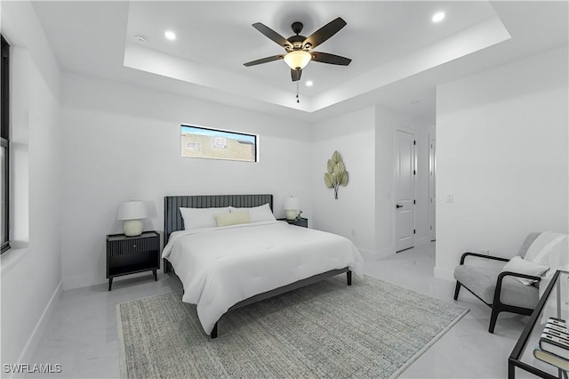 2721 NW 10th Ter, Cape Coral, FL 33993 - bedroom featuring recessed lighting, a tray ceiling, baseboards, and a ceiling fan