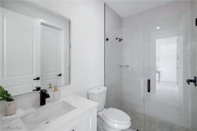 2721 NW 10th Ter, Cape Coral, FL 33993 - bathroom with a stall shower, toilet, and vanity