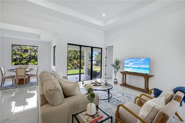 2721 NW 10th Ter, Cape Coral, FL 33993 - living area with healthy amount of natural light, a towering ceiling, and recessed lighting