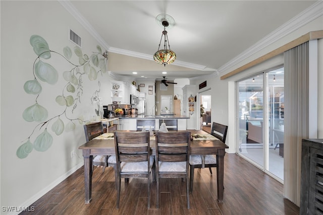 1811 NE 5th Ter, Cape Coral, FL 33909 - dining room featuring ornamental molding, ceiling fan, dark wood-type flooring, and recessed lighting
