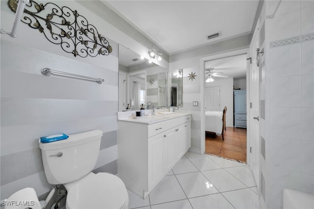 1811 NE 5th Ter, Cape Coral, FL 33909 - bathroom with vanity, ceiling fan, and tile patterned flooring