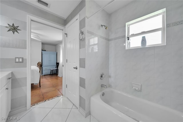 1811 NE 5th Ter, Cape Coral, FL 33909 - full bath featuring tub / shower combination, vanity, and tile patterned flooring