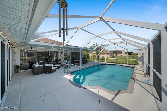 1811 NE 5th Ter, Cape Coral, FL 33909 - swimming pool featuring a patio, an outdoor hangout area, and glass enclosure