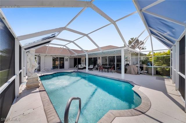 1811 NE 5th Ter, Cape Coral, FL 33909 - outdoor pool with a patio area and a lanai