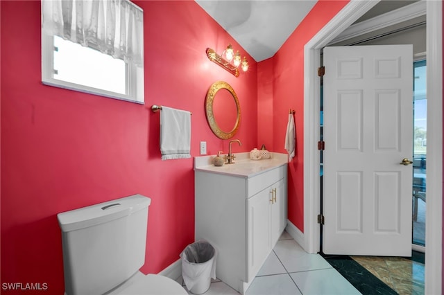 1811 NE 5th Ter, Cape Coral, FL 33909 - bathroom featuring vanity, plenty of natural light, and tile patterned floors