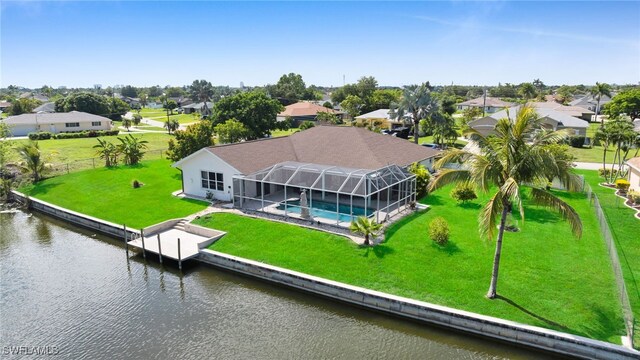 1811 NE 5th Ter, Cape Coral, FL 33909 - aerial perspective of suburban area with a nearby body of water