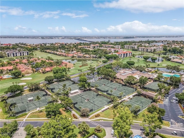 9900 Sunset Cove Ln Unit 111, Fort Myers, FL 33919 - drone / aerial view of a nearby body of water and a golf course
