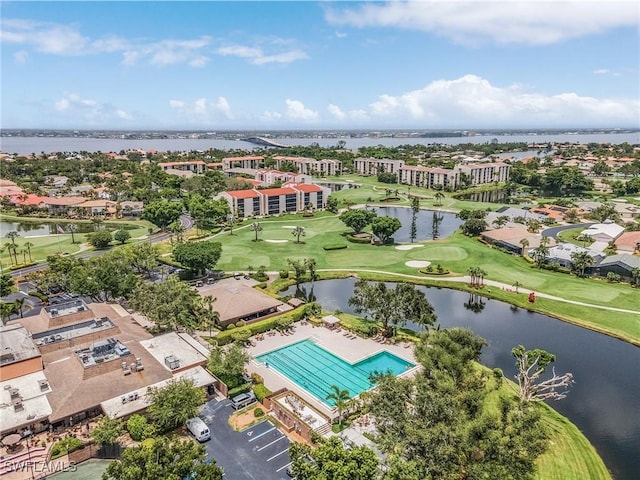 9900 Sunset Cove Ln Unit 111, Fort Myers, FL 33919 - bird's eye view of a large body of water, a golf club, and a pool