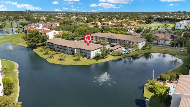 9900 Sunset Cove Ln Unit 111, Fort Myers, FL 33919 - bird's eye view of a large body of water and a golf course