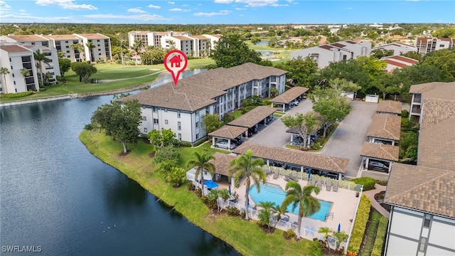 9900 Sunset Cove Ln Unit 111, Fort Myers, FL 33919 - aerial view of a nearby body of water, apartment complex / building, and a pool