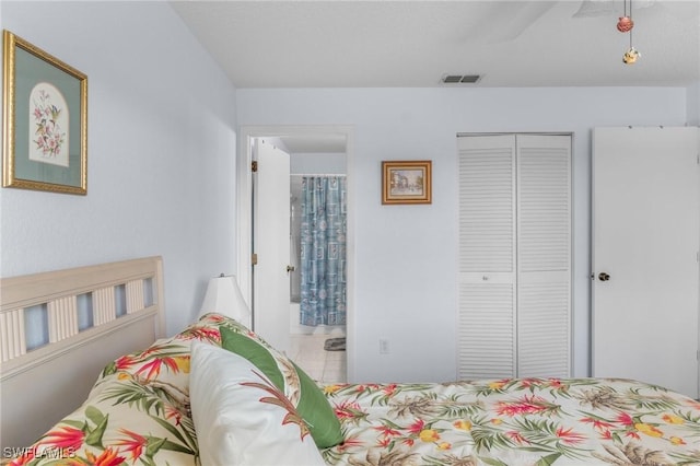 25100 Sandhill Blvd Unit R202, Punta Gorda, FL 33983 - bedroom featuring a closet and ensuite bath