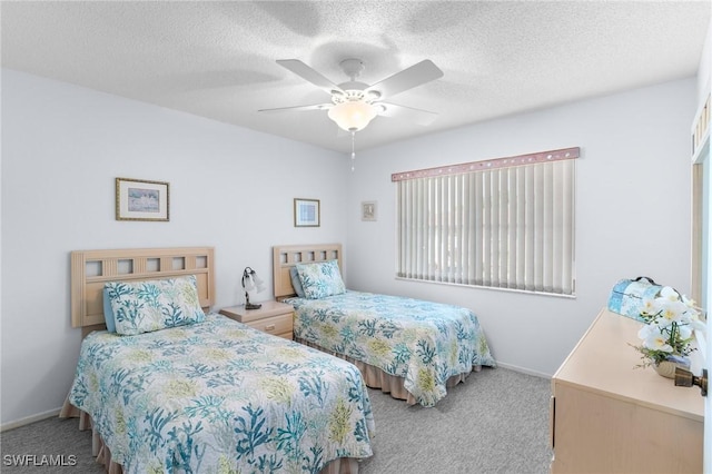 25100 Sandhill Blvd Unit R202, Punta Gorda, FL 33983 - carpeted bedroom with baseboards, a ceiling fan, and a textured ceiling